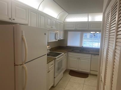 2-Bedroom Condo with Lake View in Imperial Golf Club – Annual Rental! photo 4